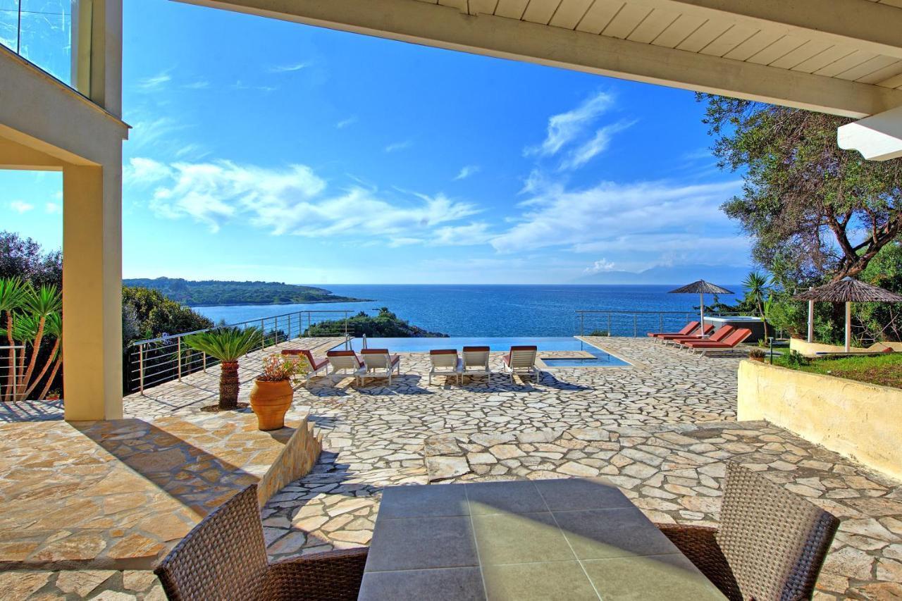 Beachfront Villa Seasun By Posarellivillas Agios Spyridon  Экстерьер фото