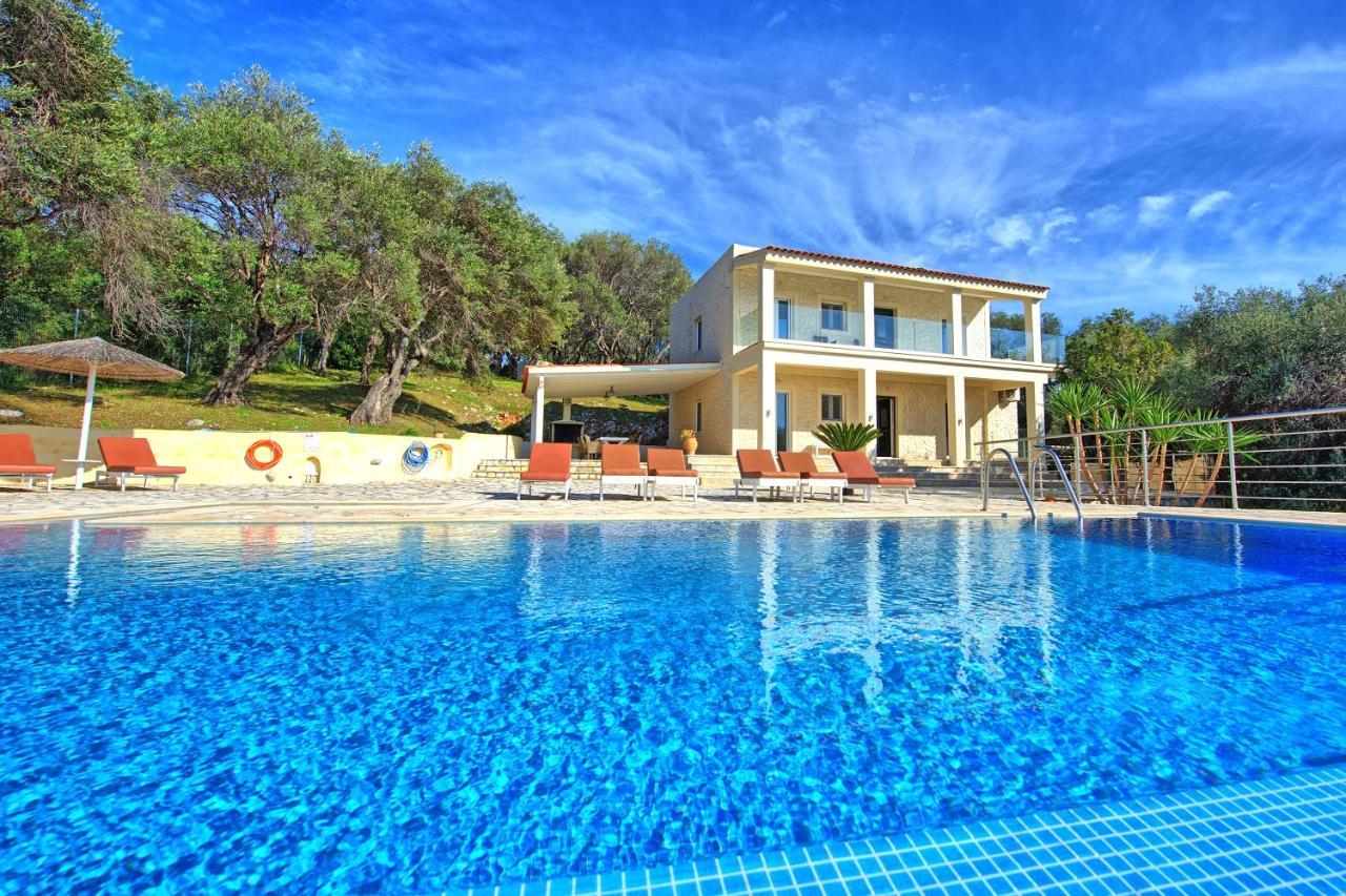 Beachfront Villa Seasun By Posarellivillas Agios Spyridon  Экстерьер фото